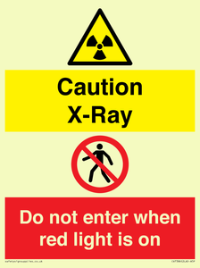 Caution X-Ray. Do not enter when red light is on